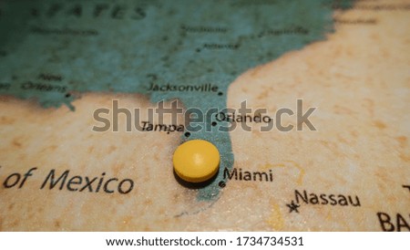 Pill on a map of Miami, Florida, USA.