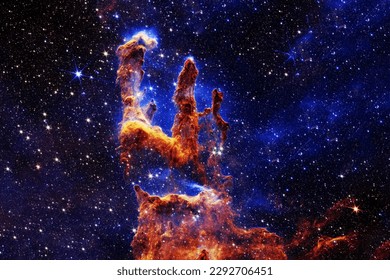 The pillars of creation, the cosmic nebula. Elements of this image furnished NASA. High quality photo - Powered by Shutterstock