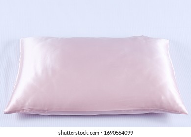 
Pillow In A Silk Pillowcase On A Light Background