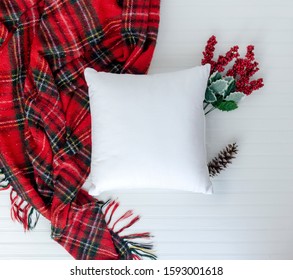 Pillow top view and styled with Christmas items with white background