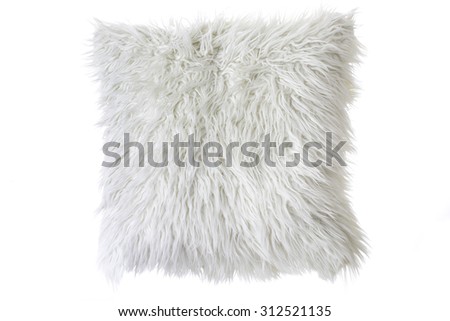 pillow with white fur cover