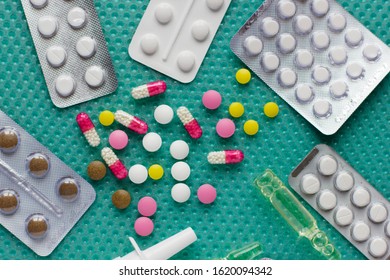 Pills, ampoules with medicine and cold spray - Shutterstock ID 1620094342