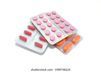 Pills in blister close-up on white background. Medicine, diseases, medicines, clinic, prescription, health - Shutterstock ID 1989748124