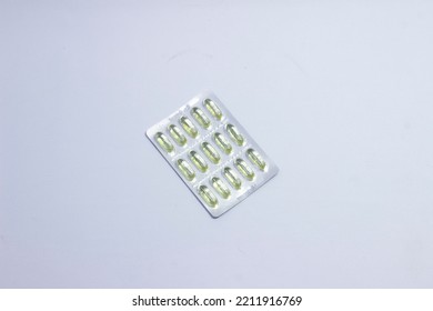  Pills In Pack On White Back Ground