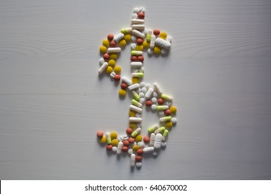 Pills In Shape Of American Dollar Money Sign Symbol 