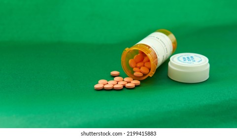 Pills Spill From Medicine Tablet Bottle 