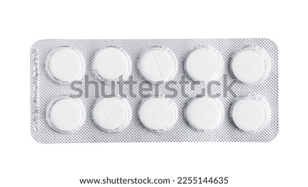 Pills, tablets in a blister pack isolated on white background, top view, healthcare and medicine concept.