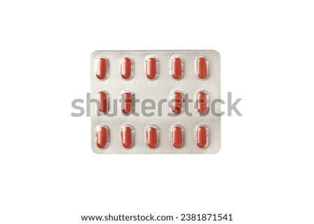 pills and tablets in a blister pack isolated on white background. top view. healthcare and medicine concept