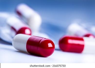 Pills and tablets.Blue background.