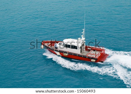 pilot boat for coat security, in caribbean ocean