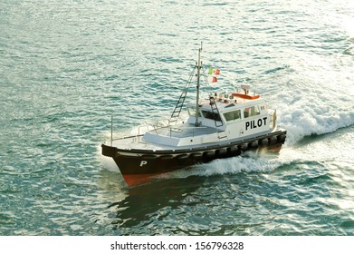 A Pilot Boat In The Harbor