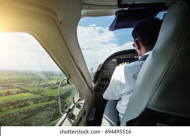 Pilot In Cockpit With Blur Pilot 