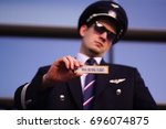 Pilot holds a keychain IOSA BEFORE FLIGHT