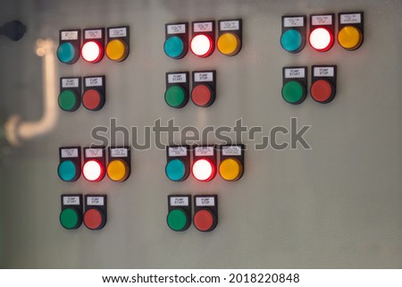 Pilot led indicators and push button switches on the cabinet panel