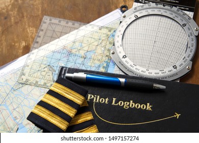 Pilot Logbook With Map And E6B Calculator