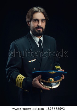 the pilot of the plane men with beard