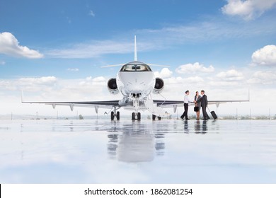 Pilot shaking hands with business employees before boarding the plane - Powered by Shutterstock