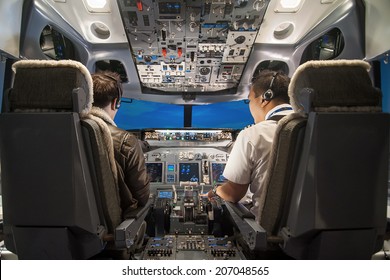 Pilot Teach Trainee Pilot To Operate The Panel