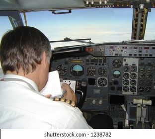 Pilot In A Uniform Operating 737 Boeing - Inside Cockpit