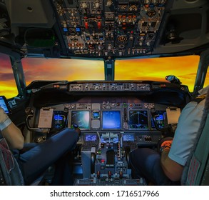 Pilots Airplane Interior View Cockpit Flight Deck Passenger Aircraft Sunset Windows Background