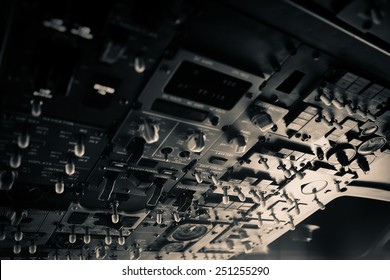 The pilots' control panel inside a passenger airplane.