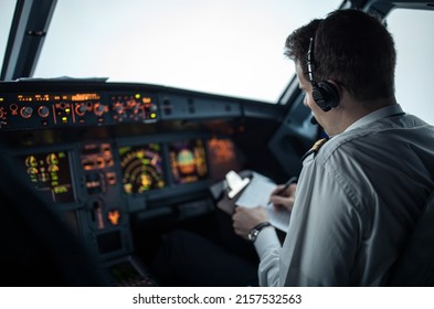 Pilot's Hand Accelerating On The Throttle In  A Commercial Airliner Airplane Flight Cockpit During Takeoff