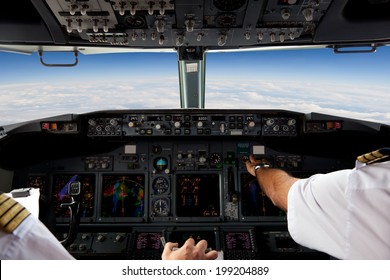 Pilots Working in an Aircraft During a Commercial Flight