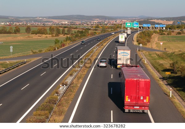 PILSEN, CZECH REPUBLIC - OCTOBER 2,
2015: Line of trucks on the D5 highway. The D5 is important
transport connection between West Bohemia and Bavaria in
Germany.