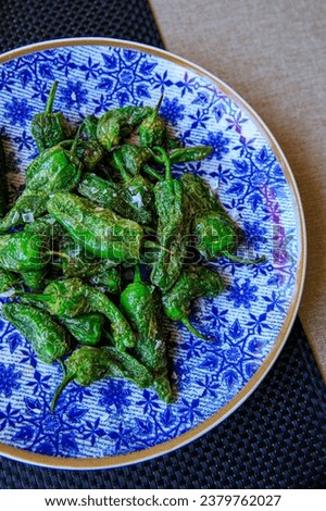 Pimientos de Padrón, Spanish green peppers, on a plate in a restaurant on Gran Canaria