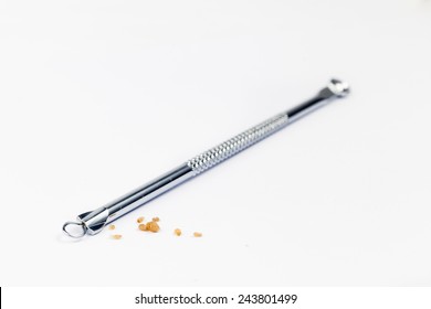 Pimple Popping Tool And The Extracted Blackheads