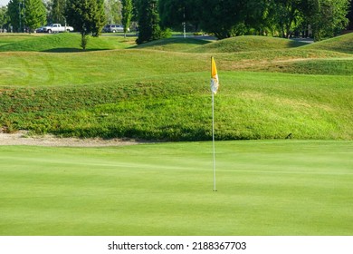 Pin Flag On Gold Course Green