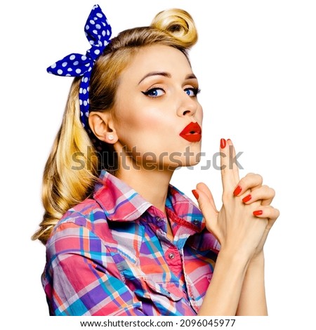 Pin up girl. Portrait of blond beautiful woman showing hand sign gesture. Retro and vintage concept. Isolated over white background. Pinup model posing at studio. Square composition.