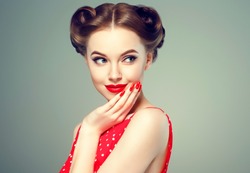 Pin Up Girl Vintage. Wow Expressions Emotion! Beautiful Woman Pinup Style Portrait In Retro Dress And Makeup, Manicure Nails Hands, Red Lipstick And Polka Dot Dress, Surprised Face.