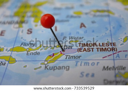 Pin marked Dili on map, East Timor