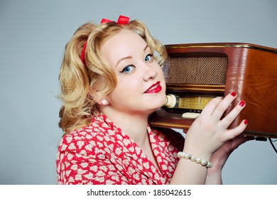 Pin Up Plus Size Blonde Girl Posing With Old Fashioned Radio