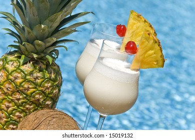 Pina Colada Cocktail By The Swimming Pool