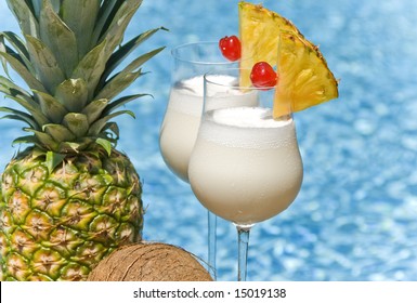 Pina Colada Cocktail By The Swimming Pool