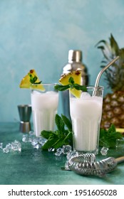 Pina Colada - Coconut And Pineapple Cocktail With Cream In A Tall Glasses.