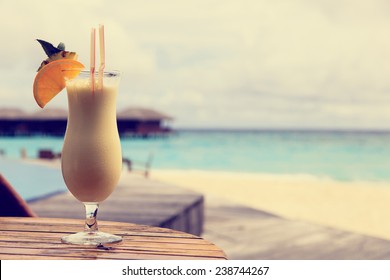 pina colada on tropical beach vacation