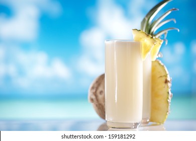 pinacolada pina colada cocktail on beach