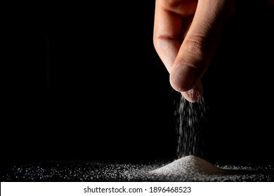 A pinch of salt with hand