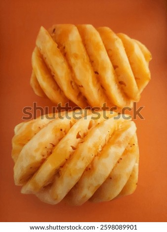 Pine aplle with orange background