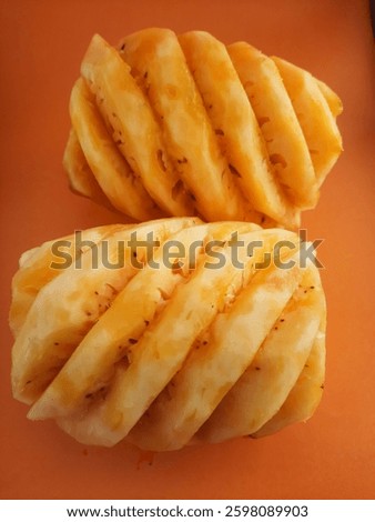 Pine aplle with orange background