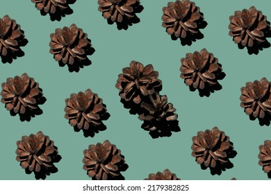 Pine Cones On A Green Background Pattern