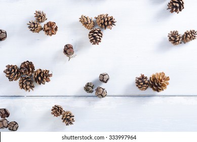 Pine Cones On White Wood Table, Purity Christmas Decoration