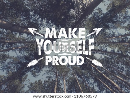 Pine forest low angle shot and "Make yourself proud" inspiring lettering. Adventures in the wild.