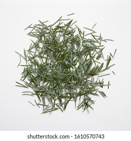 Pine Needles On A White Background Cleaning Up After Christmas Holiday