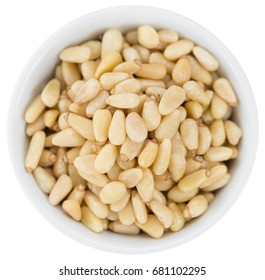 Pine Nuts isolated on white background (selective focus; close-up shot)