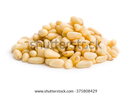 pine nuts on white background