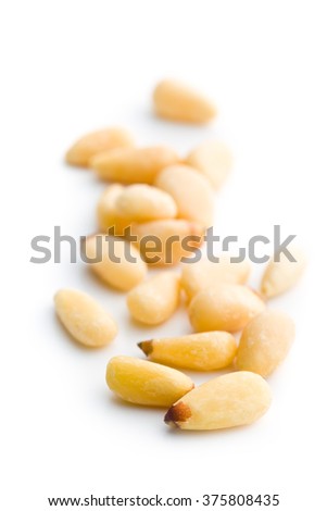 pine nuts on white background